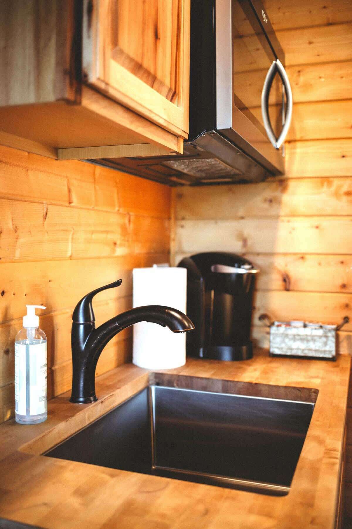 Fridge, microwave, stovetop, coffee/tea maker