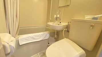 Combined shower/tub, deep soaking tub, hair dryer, slippers