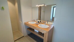 Bathtub, hair dryer, towels, soap