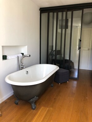 Combined shower/tub, hair dryer, towels, toilet paper
