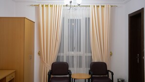 Standard Twin Room, 2 Twin Beds, Mountain View | Desk, laptop workspace - Oasis Hotel Apartments (Muscat)