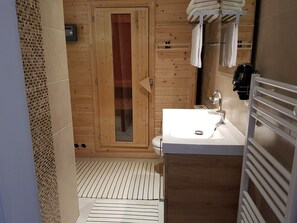 Shower, hair dryer, towels, soap