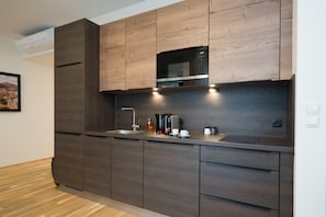 Deluxe Apartment (Top 35) | Private kitchen | Fridge, microwave, stovetop, espresso maker - myApartments Vienna (Vienna)