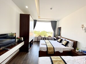 Panoramic Quadruple Room | Down duvets, pillow-top beds, minibar, desk - Hotel Duc Thanh 2 (Ho Chi Minh City)