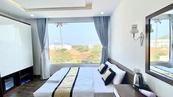 Down duvets, pillow-top beds, minibar, desk
