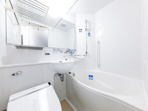 Ensemble douche/baignoire, articles de toilette gratuits, sèche-cheveux