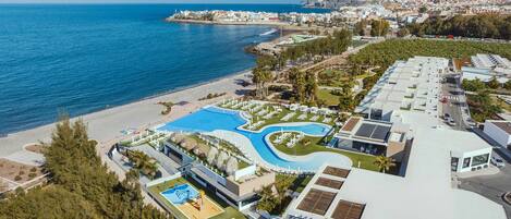 2 outdoor pools, pool umbrellas, sun loungers