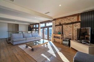 Loft Panoramique | Coin séjour | TV connectée