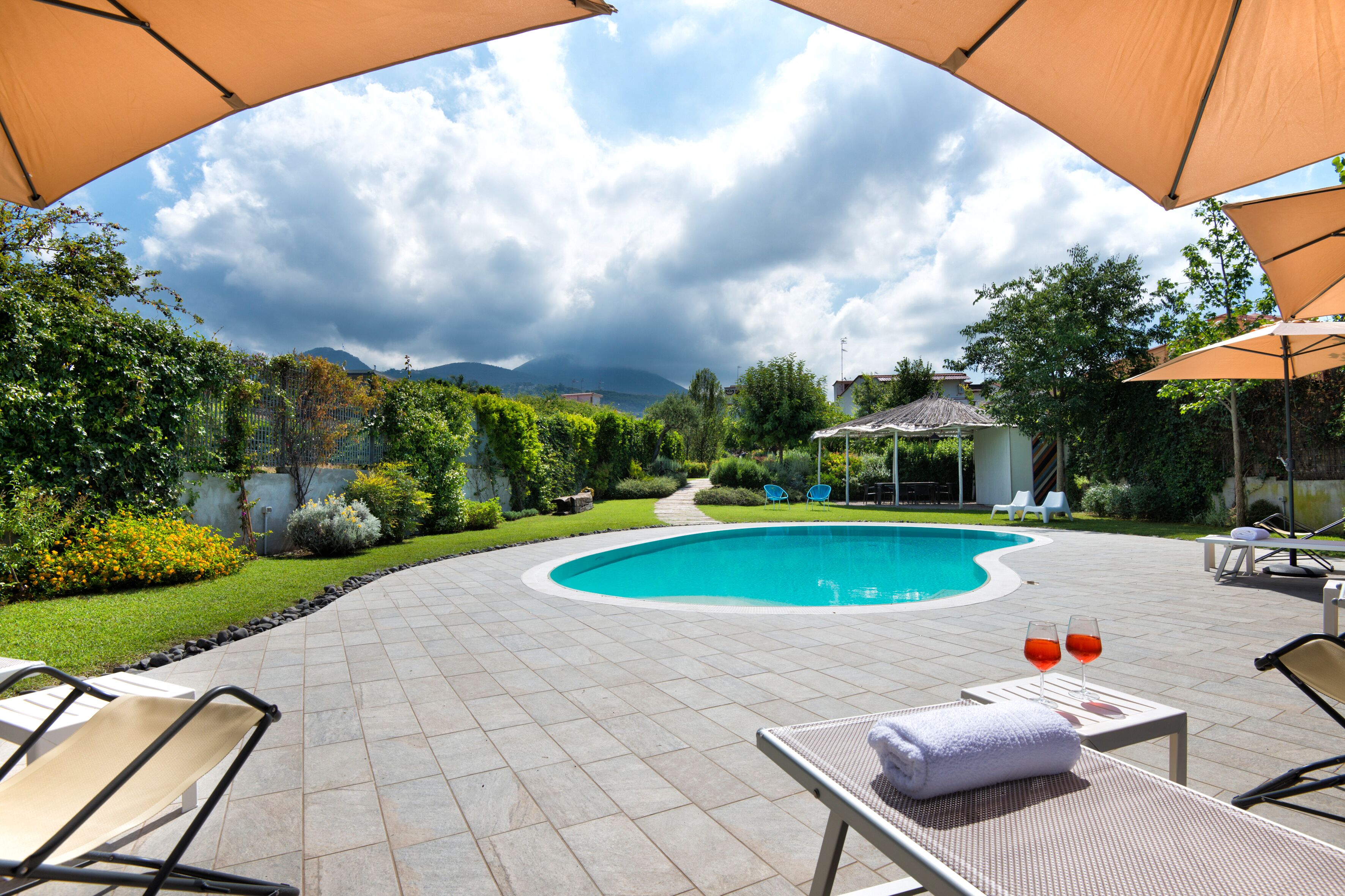 Seasonal outdoor pool, pool umbrellas, pool loungers