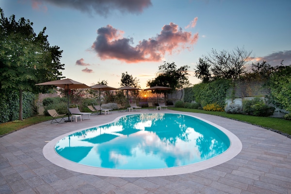 Seasonal outdoor pool, pool umbrellas, sun loungers