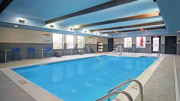 Indoor pool, open 9:00 AM to 10:00 PM, pool loungers