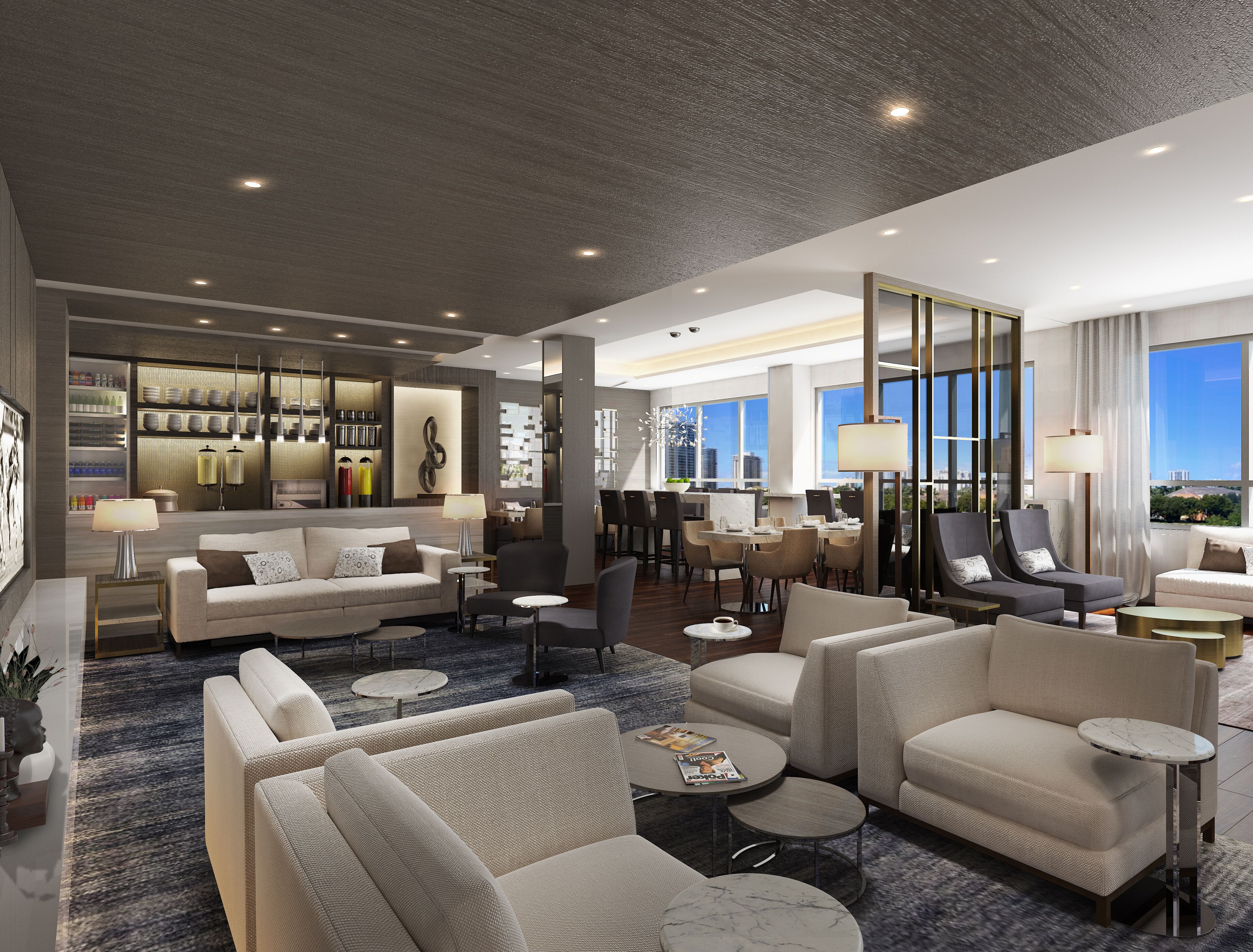 A modern hotel lobby with a seating area, a bar, and a dining space.