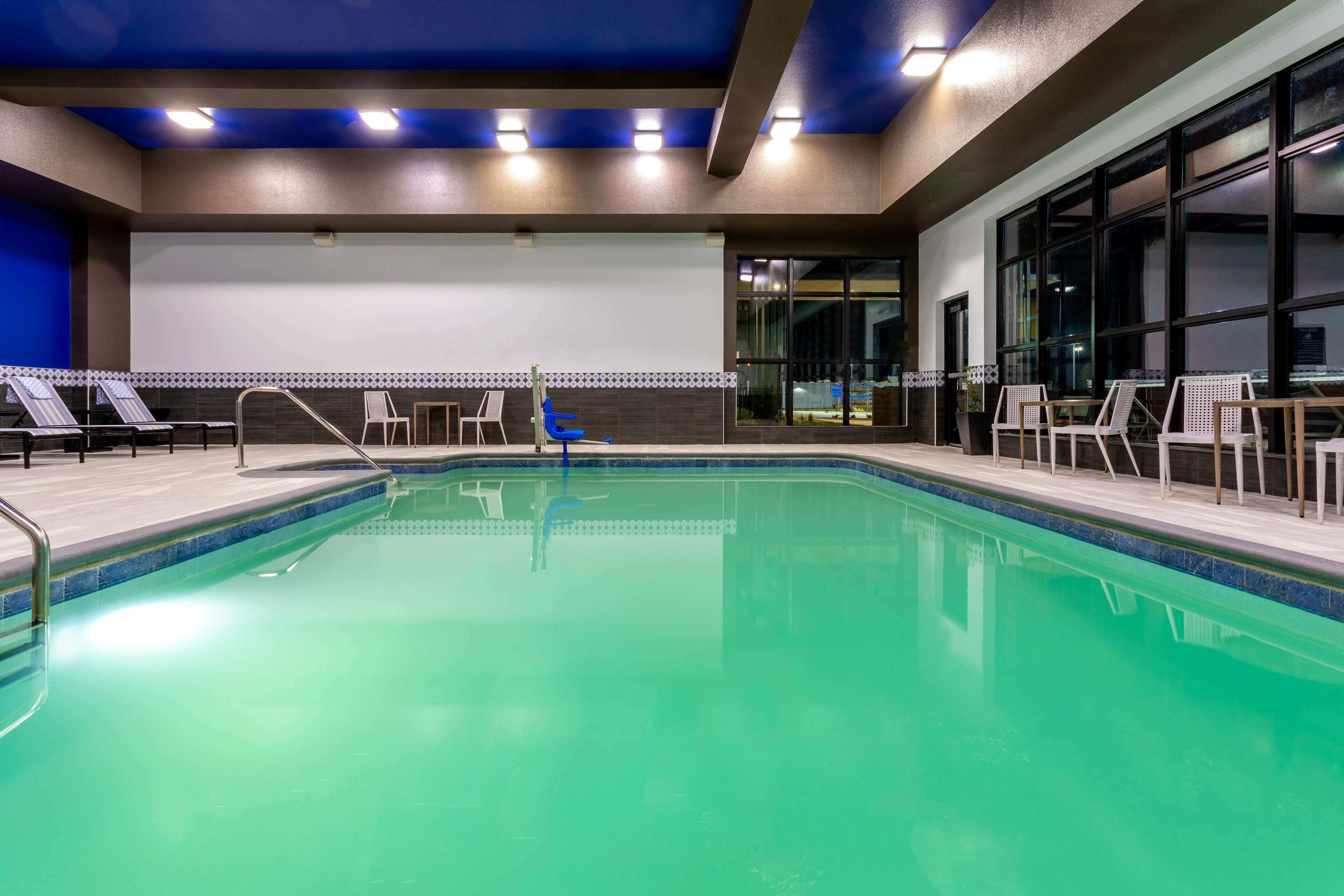 Indoor pool, open 7:00 AM to 10:00 PM, sun loungers