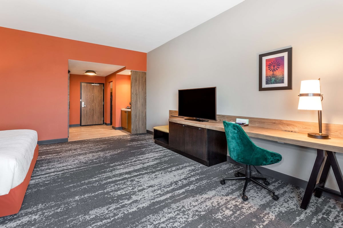 premium bedding, pillow-top beds, desk, laptop workspace