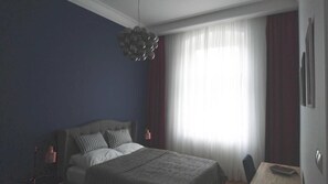 1 habitación, tabla de planchar con plancha, wifi y ropa de cama 