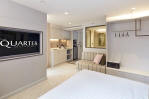 Deluxe Studio Suite, Kitchenette, Corner | Private kitchenette | Fridge, electric kettle - The Quarter Ploenchit by UHG (Bangkok)