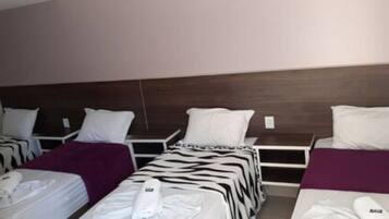 Quarto standard | Frigobar, escrivaninha, Wi-Fi de cortesia