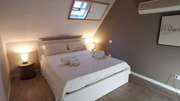 2 bedrooms, travel crib, WiFi, bed sheets
