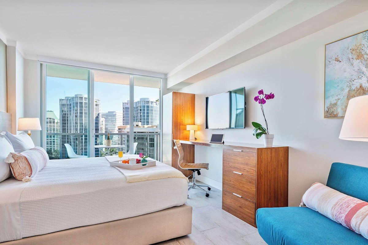 City Room, Partial Ocean View | Premium bedding, in-room safe, desk, laptop workspace