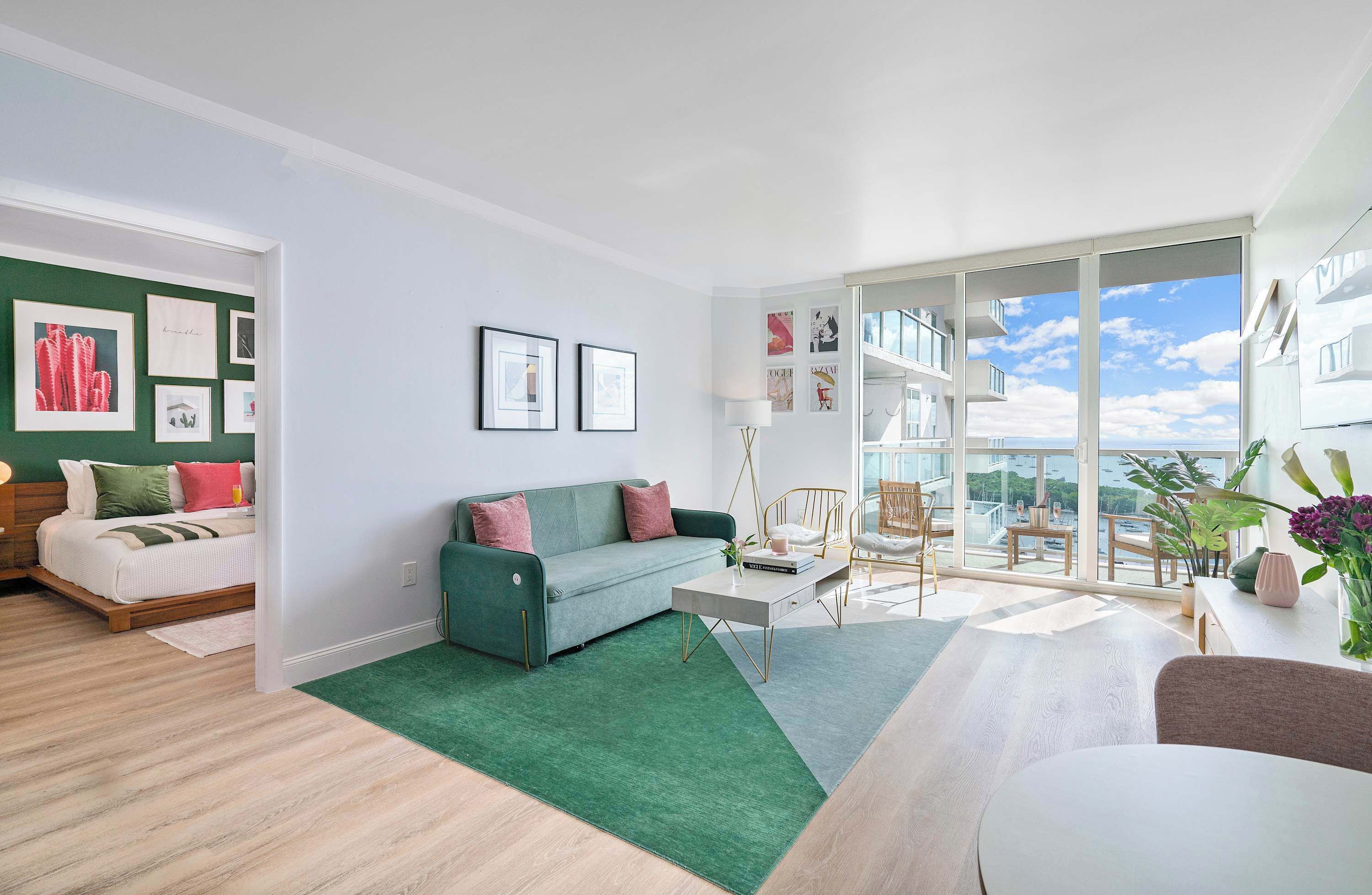 Deluxe Apartment, Balcony, Partial Ocean View | Living area | 49-inch LED TV with cable channels, TV