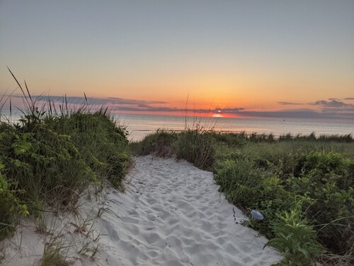Pet Friendly! Water Views from roof deck. Steps to the beach and sunsets.