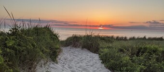 Pet Friendly! Water Views from roof deck. Steps to the beach and sunsets.