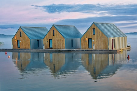 Laptop workspace, blackout drapes, bed sheets