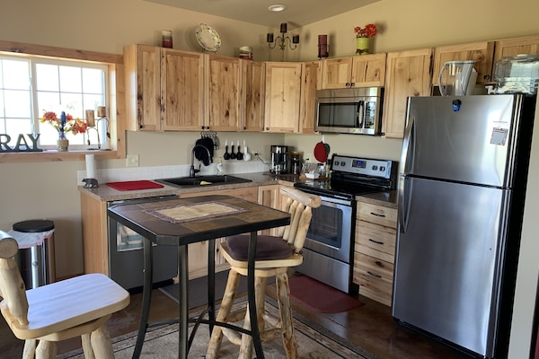 Microwave, dishwasher, coffee/tea maker, cookware/dishes/utensils