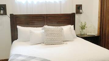 2 quartos, ferros/tábuas de passar roupa, berço de viagem