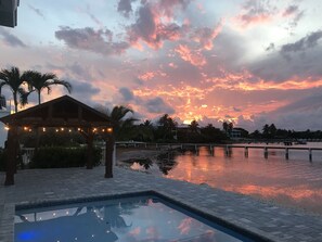 A heated pool, pool loungers