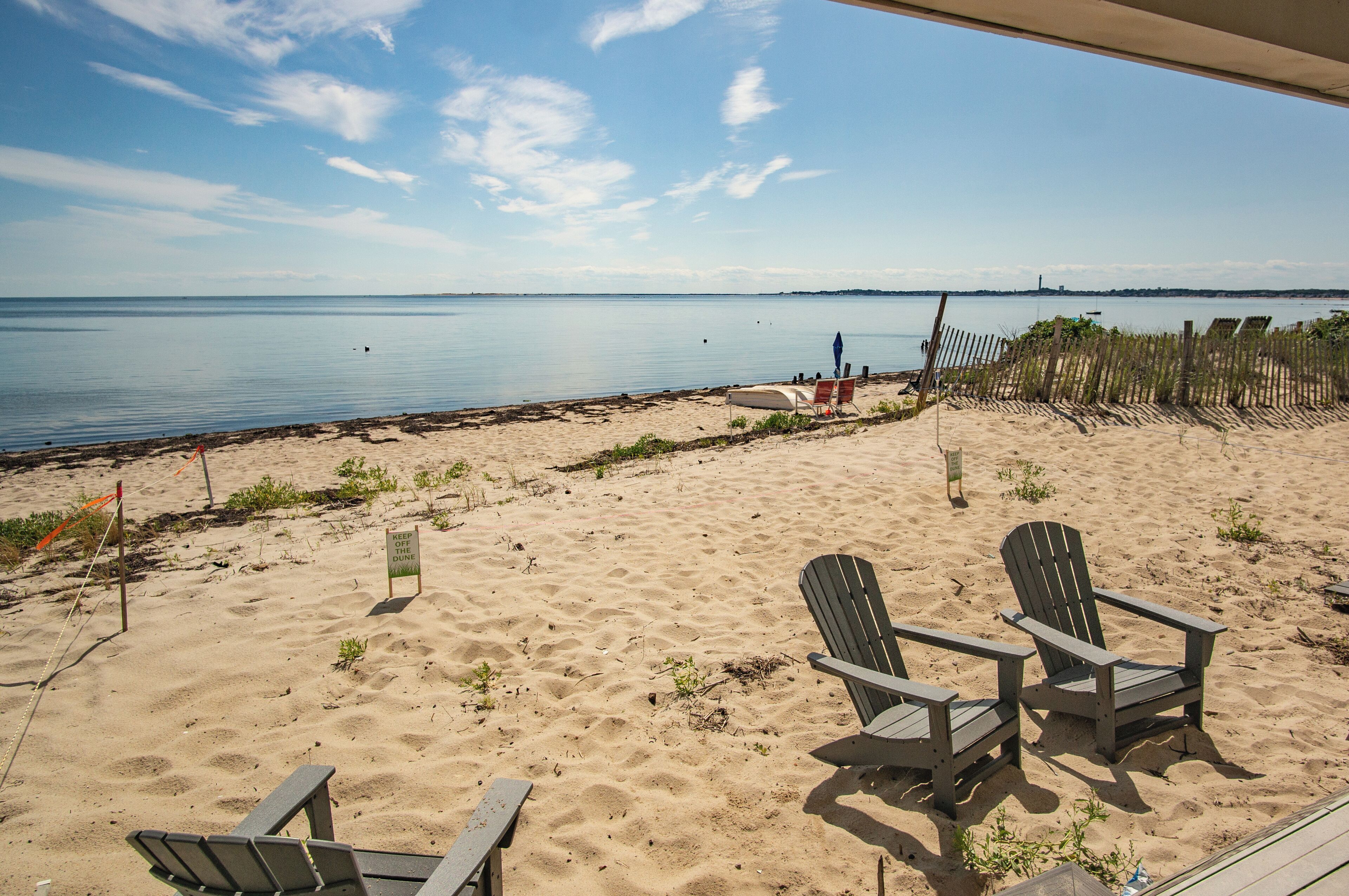 On the beach, sun loungers, beach towels