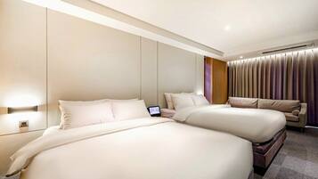 Premium bedding, down duvets, memory-foam beds, in-room safe