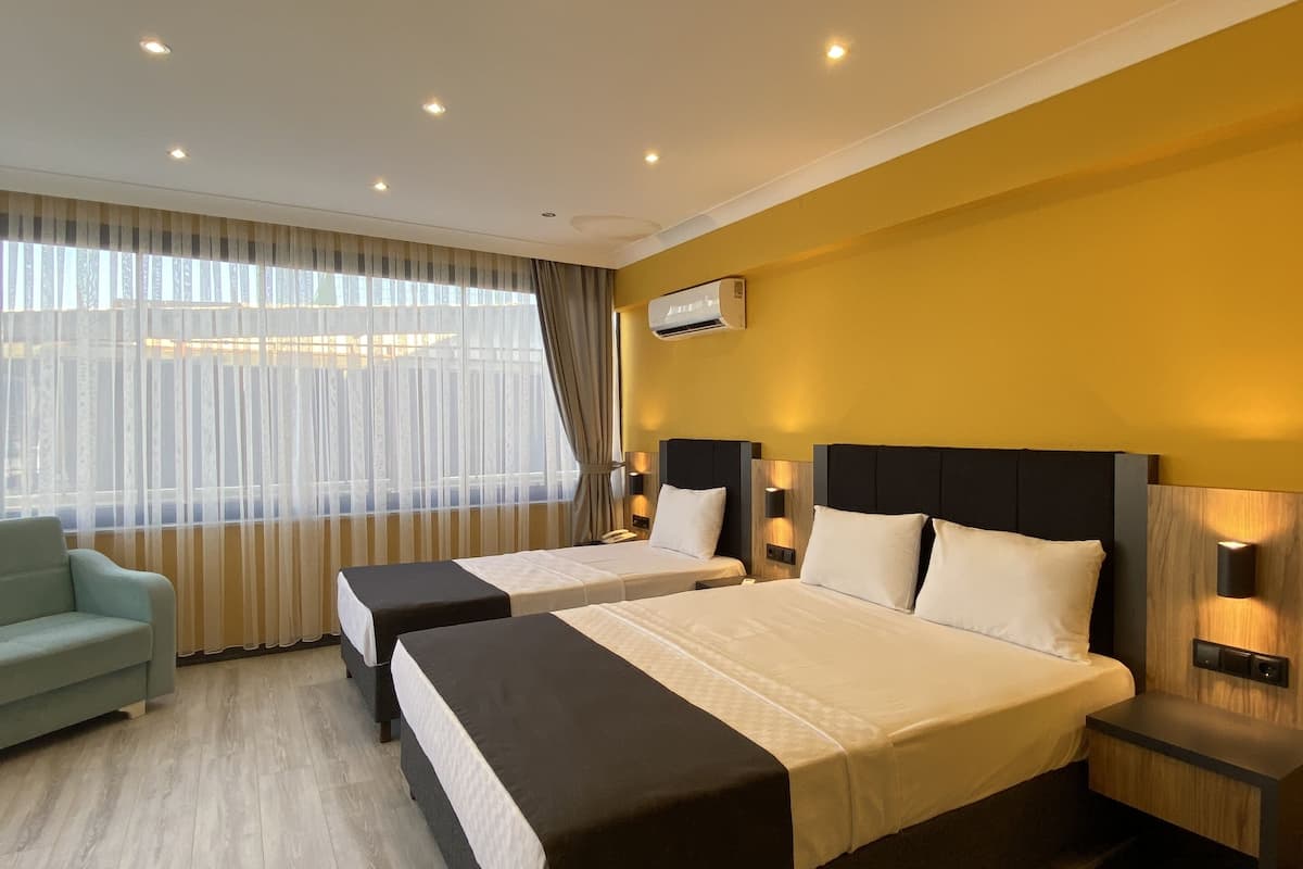 classic triple room, city view | free wifi, bed sheets