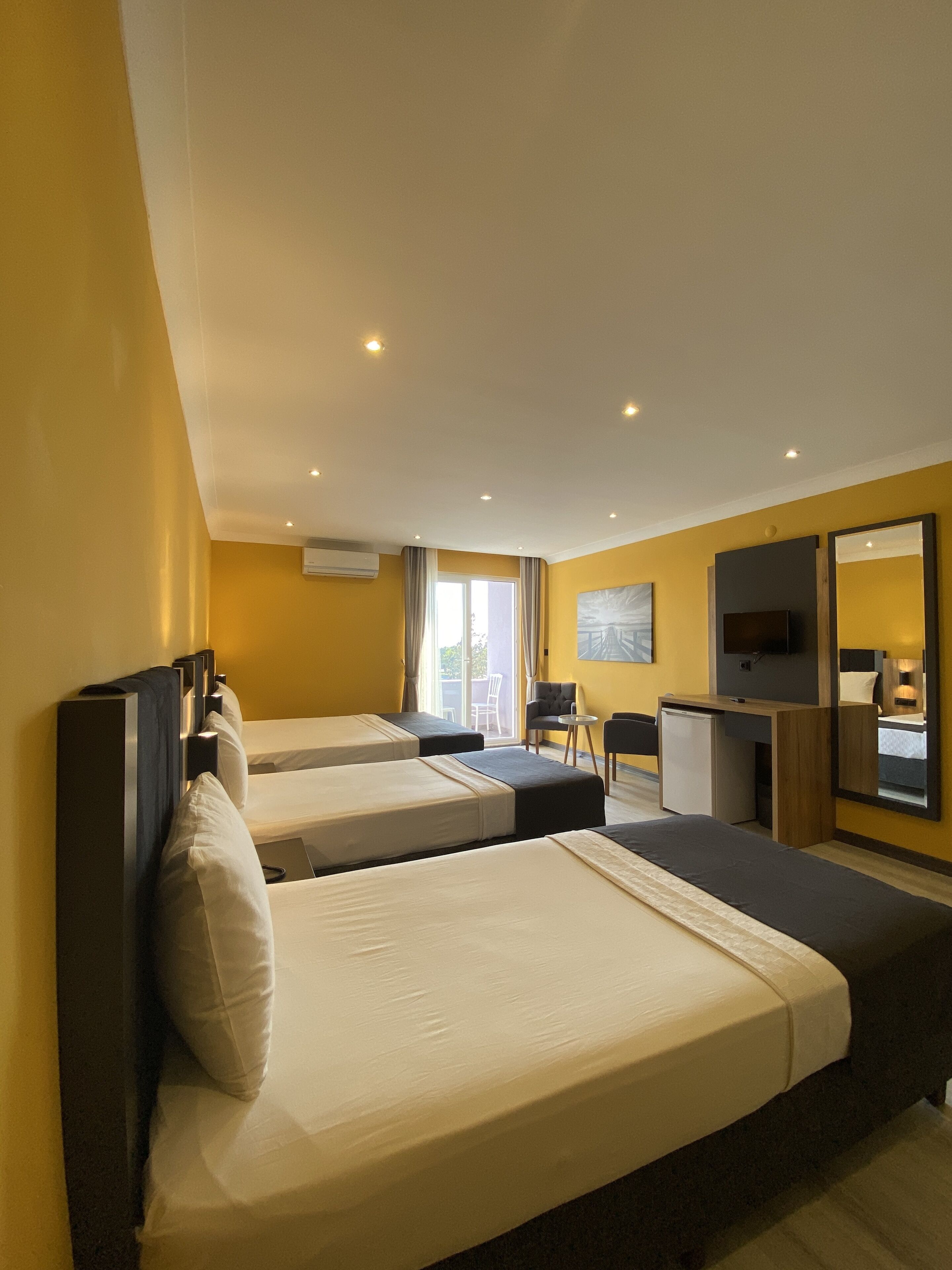 classic quadruple room, sea view | free wifi, bed sheets