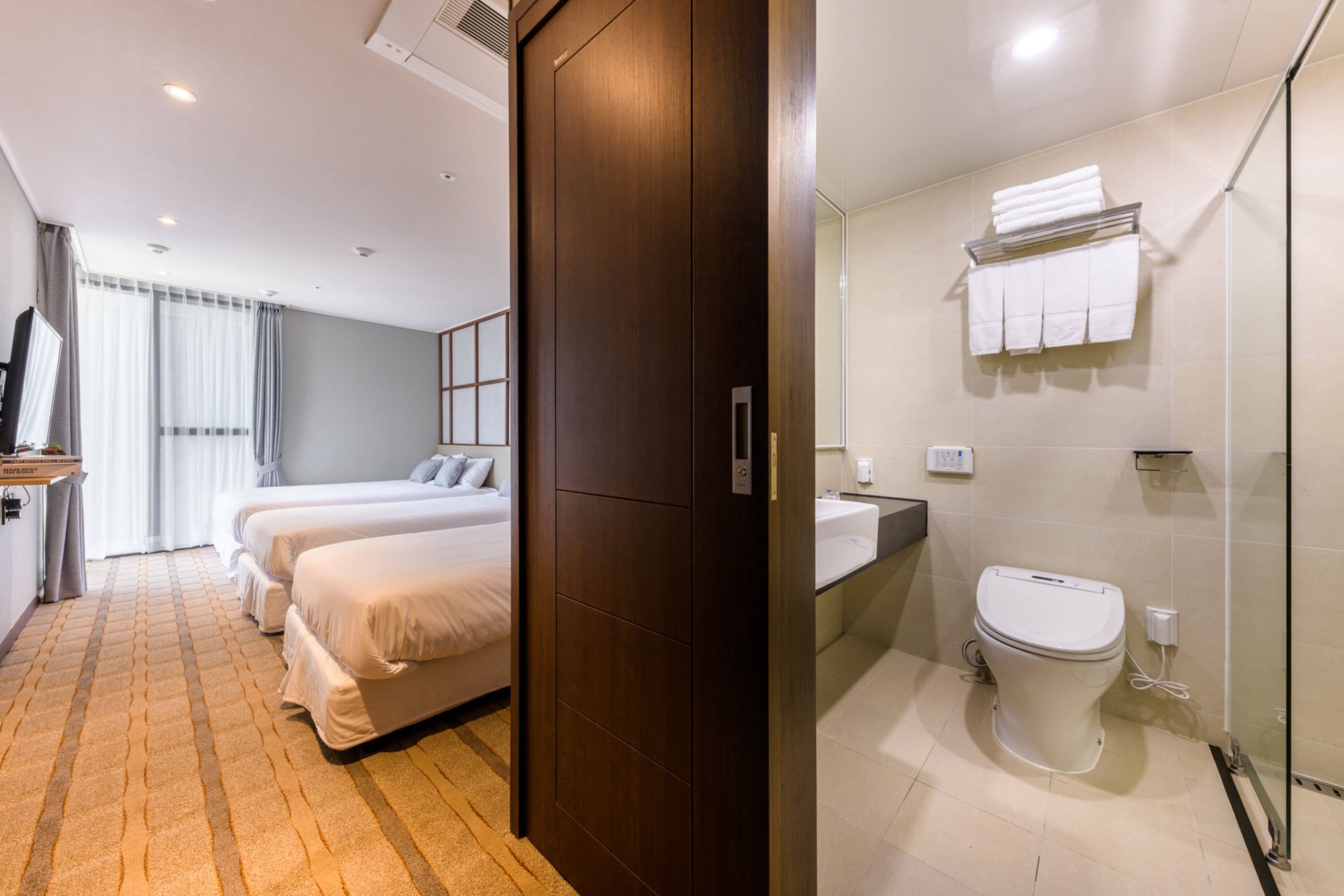 family triple room | bathroom | shower, hair dryer, slippers, bidet
