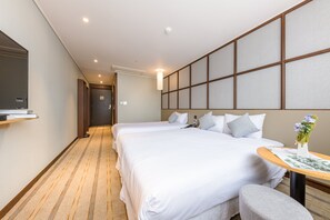 Chambre Familiale avec lits jumeaux | Chambres insonorisées, Wi-Fi gratuit