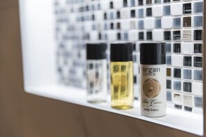 Hair dryer, towels, soap, shampoo