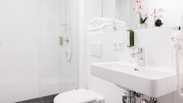 Hair dryer, towels, soap, shampoo