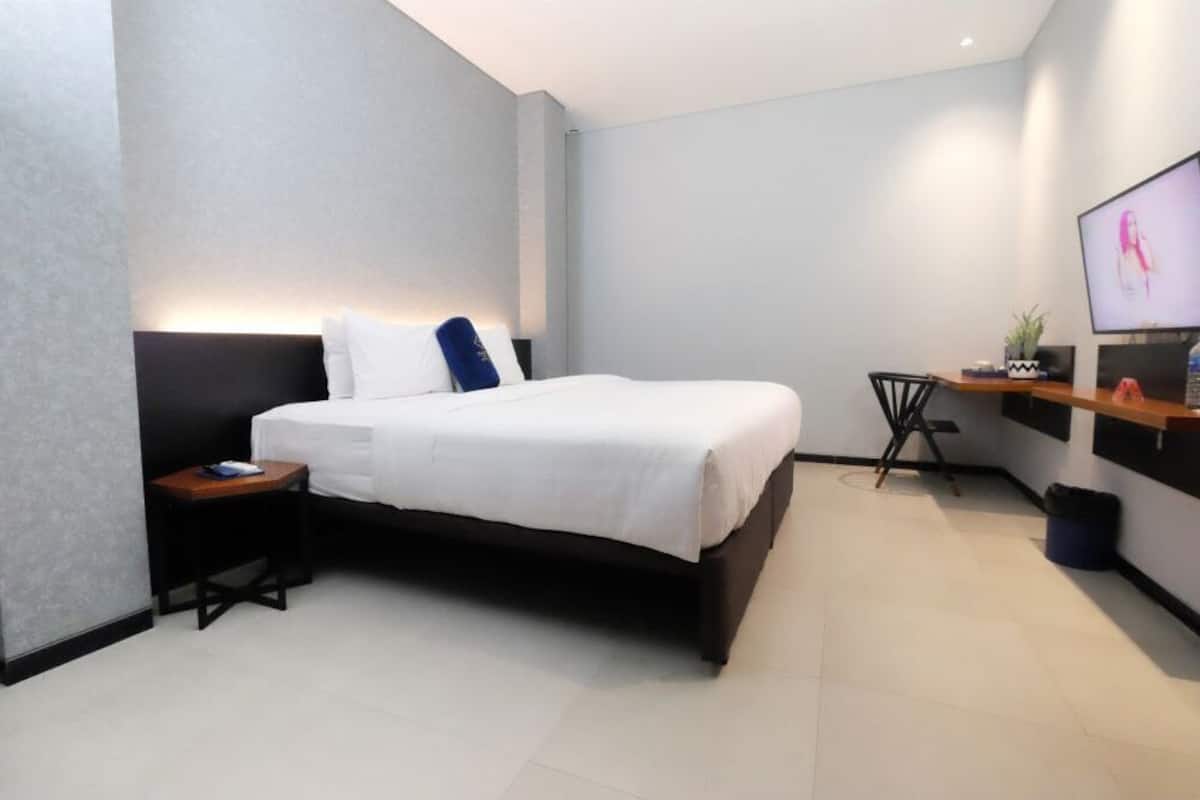 Habitación Deluxe con 1 cama doble o 2 individuales | Escritorio, wifi gratis, ropa de cama