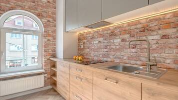 Departamento, 2 habitaciones (4 adults) | Cocina privada | Refrigerador, lavavajillas, tetera eléctrica y utensilios de cocina