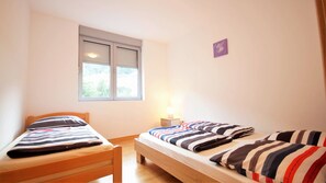 Appartement familial (6) | 1 chambre, literie de qualité, accès au Wi-Fi (inclus), literie fournie