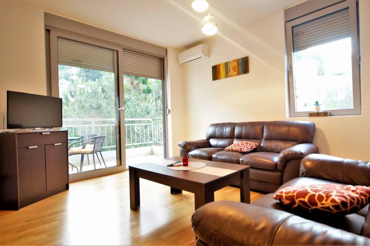 35-inch flat-screen TV with satellite channels, TV
