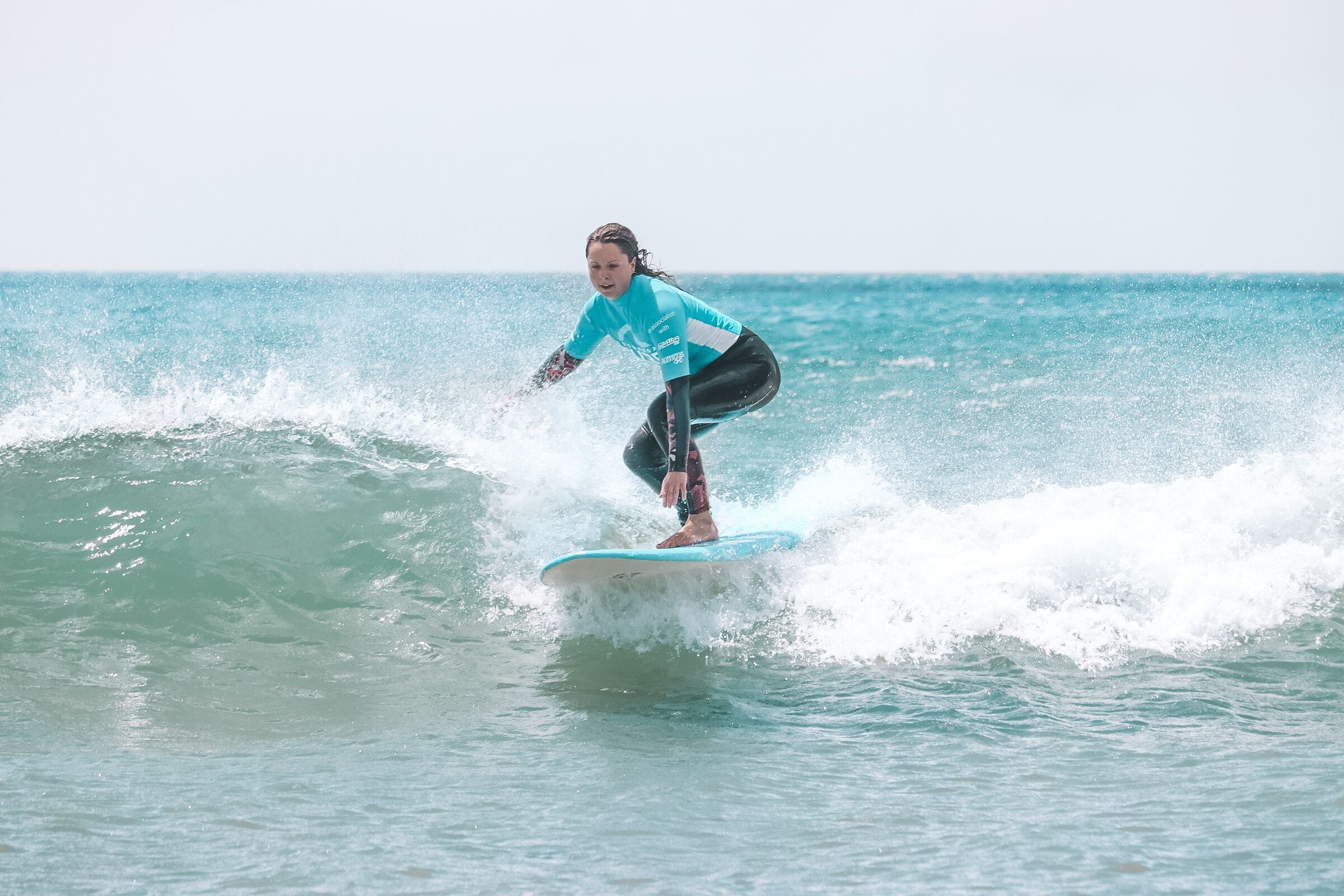 A person surfing on a wave.