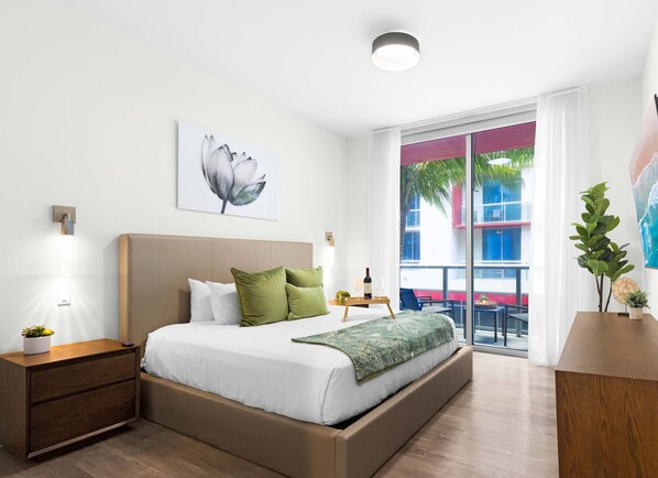 1 bedroom, desk, iron/ironing board, travel crib