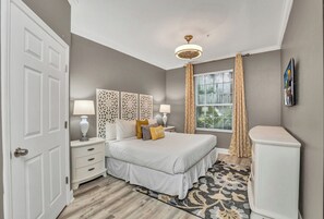 Master's bedroom with an ensuite bathroom - Resort Oasis! 3BR w Pool Access near Disney World (Kissimmee)