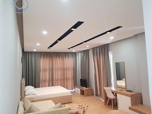 Chambre Double Deluxe | Coin séjour