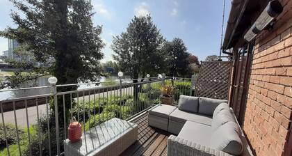 River facing town house with balcony and parking at Trent Bridge.