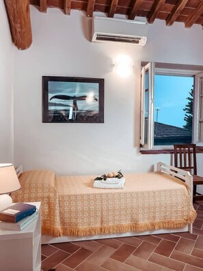 2 dormitorios, tabla de planchar con plancha, cuna de viaje y wifi