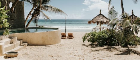 On the beach, sun-loungers, beach towels