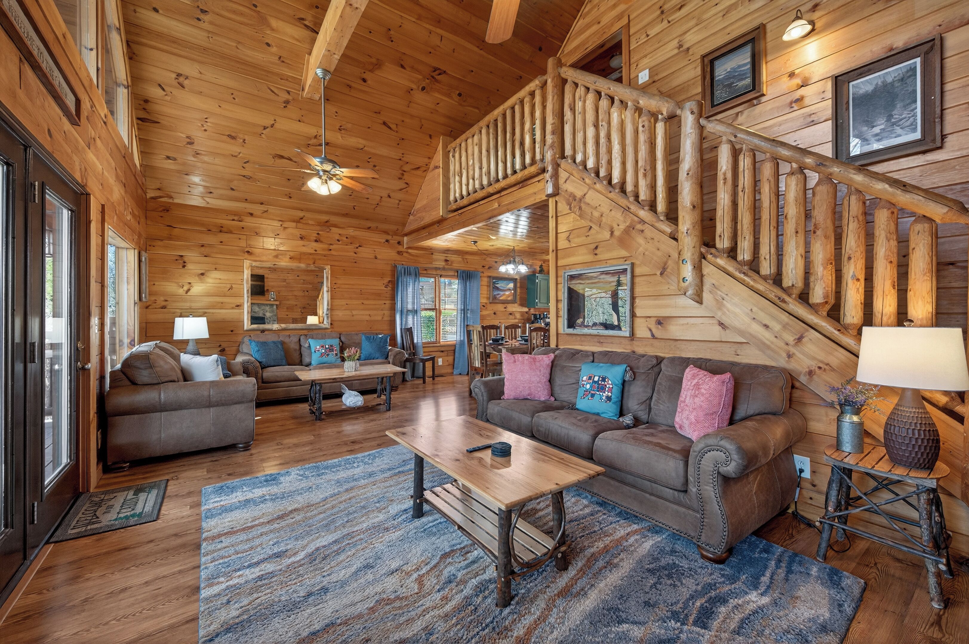 Main Floor Living Area.  3 Couches (1 a Queen Pullout) & large Smart TV